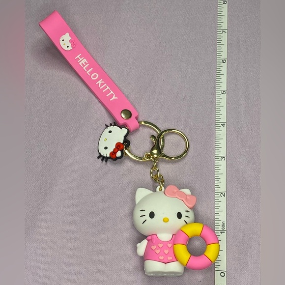‼️CLEARANCE‼️ 🩷🐱 Hello Kitty Summer Fun 3D Keychain and Silicone Wristlet - Picture 3 of 3